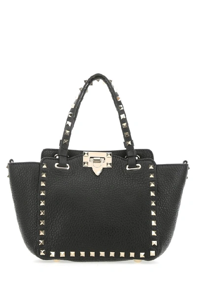 Shop Valentino Garavani Rockstud Mini Handbag In Black