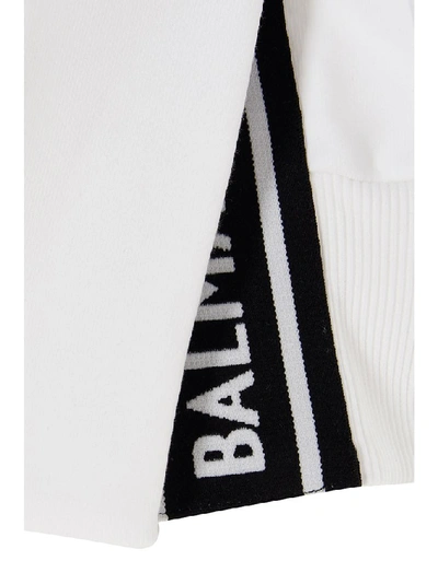 Shop Balmain Flocked Logo Cropped Hoodie In White