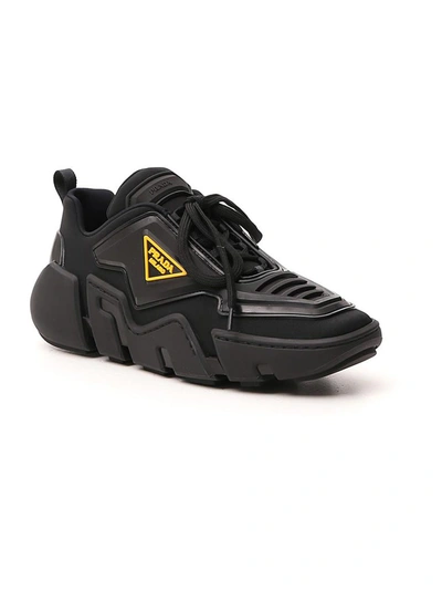 Shop Prada Logo Plaque Chunky Sole Sneakers In Black