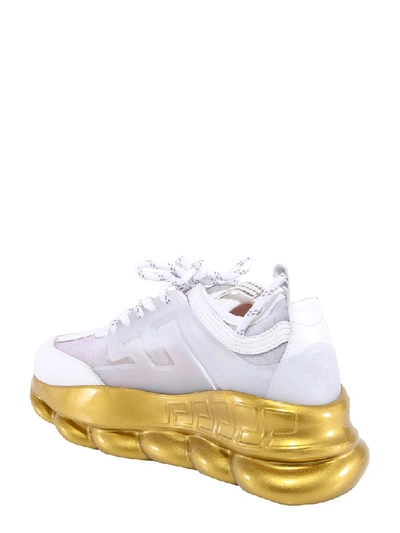 Shop Versace Chain Reaction Sneakers In White