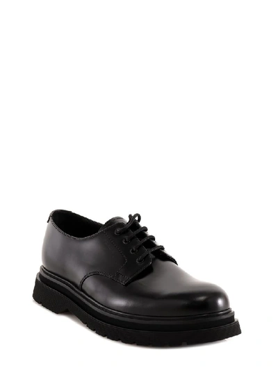 Shop Prada Classic Lace Up Brogues In Black