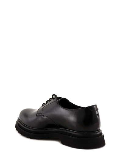 Shop Prada Classic Lace Up Brogues In Black