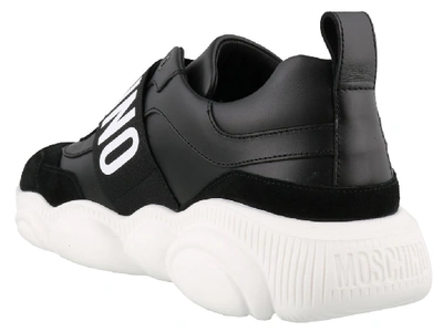 Shop Moschino Teddy Logo Band Sneakers In Black