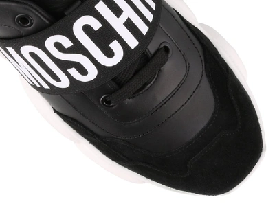 Shop Moschino Teddy Logo Band Sneakers In Black