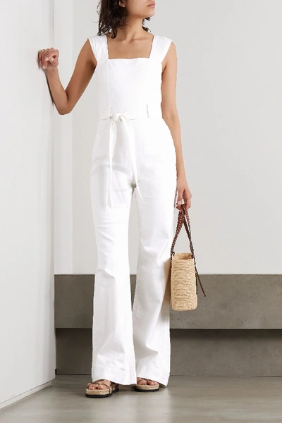 Shop Alice And Olivia Gorgeous Belted Denim Jumpsuit In White