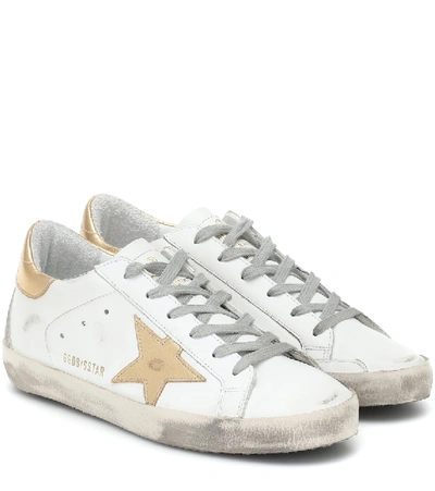 Shop Golden Goose Super-star Leather Sneakers In White/gold