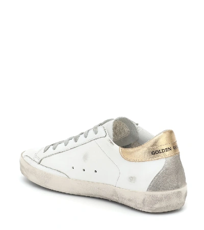 Shop Golden Goose Super-star Leather Sneakers In White/gold