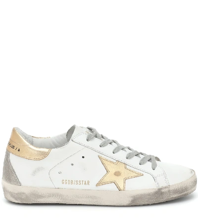 Shop Golden Goose Super-star Leather Sneakers In White/gold