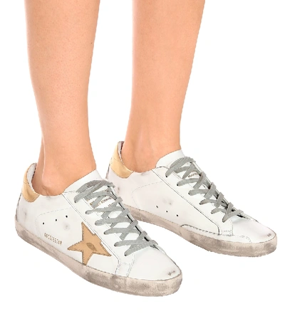 Shop Golden Goose Super-star Leather Sneakers In White/gold