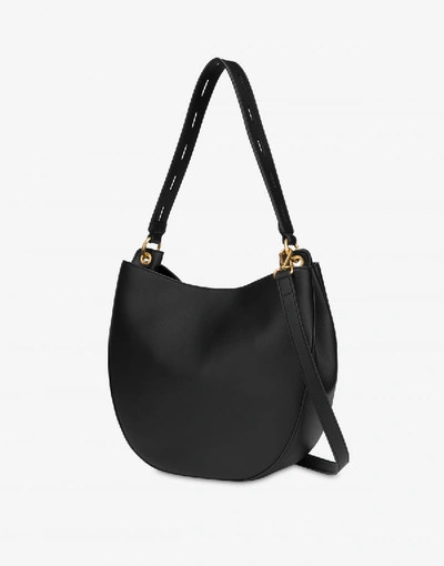 Shop Love Moschino Round Buckle Hobo Bag In Black