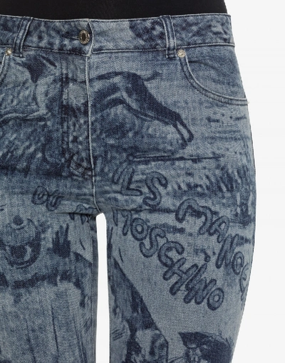 Shop Moschino Printed Denim Pants In Blue