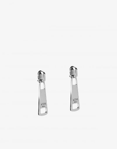 Shop Moschino Macro Zip Puller Earrings In Silver