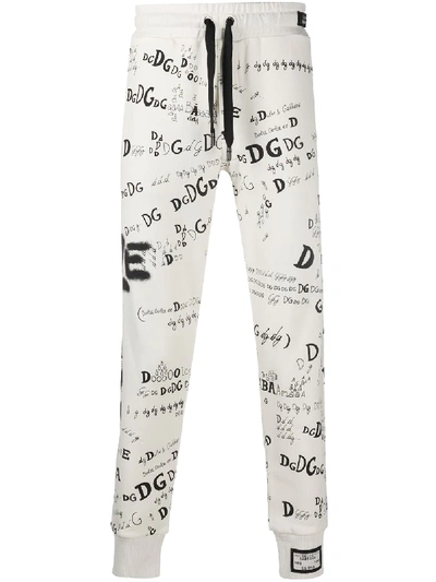 Shop Dolce & Gabbana Slogan Print Track Pants In White