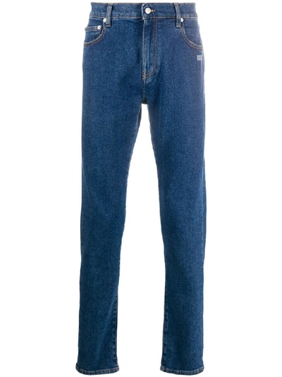 Shop Off-white Diagonal Pocket Skinny Jeans In Blue