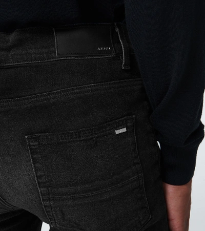 Shop Amiri Thrasher Jeans In Black