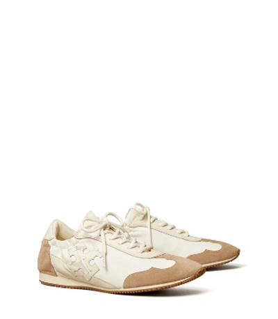 Shop Tory Burch Tory Sneaker In White/new Ivory/cerbiatto