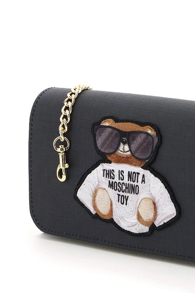 Shop Moschino Teddy Bear Sunglasses Mini Bag In Black