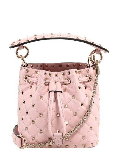 Shop Valentino Small Rockstud Spike Bucket Bag In Pink