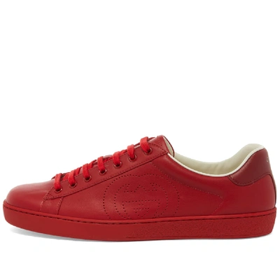 Shop Gucci Perforated Gg New Ace Leather Sneaker In Red