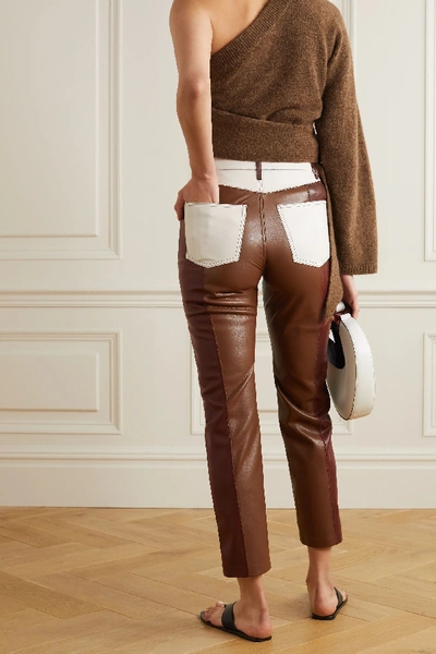 Shop Nanushka Vinni Cropped Color-block Vegan Leather Straight-leg Pants In Brown