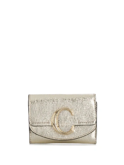 Shop Chloé C Mini Tri-fold Wallet In Gold