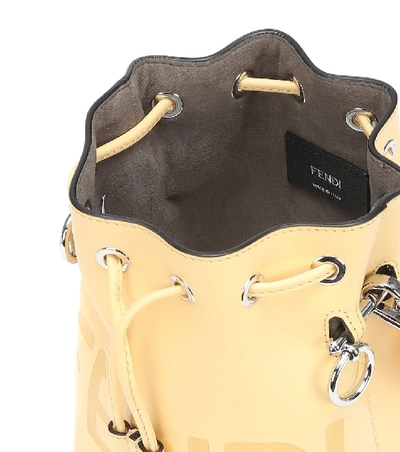 Shop Fendi Mon Trésor Mini Leather Bucket Bag In Yellow