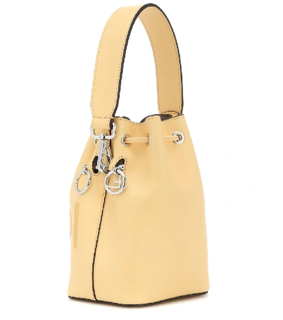 Shop Fendi Mon Trésor Mini Leather Bucket Bag In Yellow