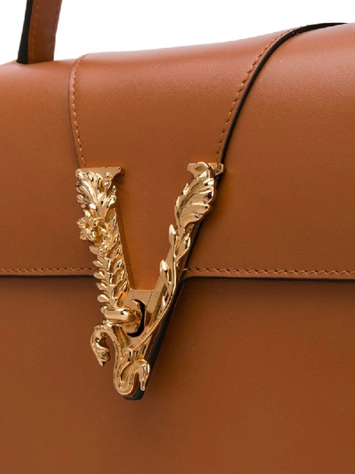 Shop Versace Virtus Top Handle Bag In Brown