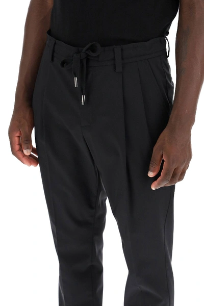 Shop Dolce & Gabbana Stretch Wool Jogger Pants In Black