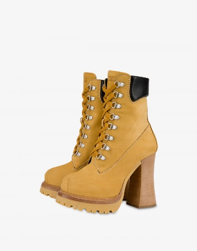 Shop Moschino High Nabuk Ankle Boots In Beige