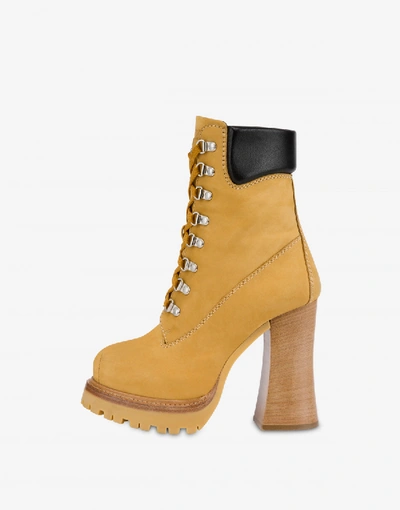 Shop Moschino High Nabuk Ankle Boots In Beige