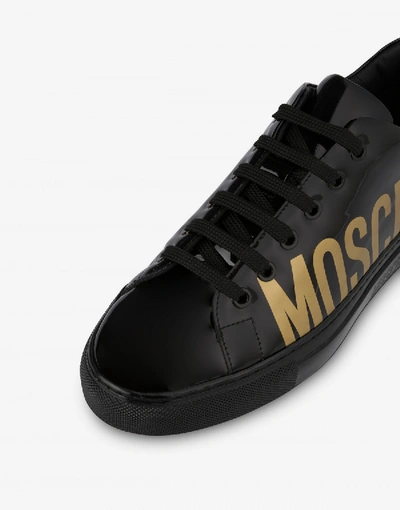 Shop Moschino Maxi Logo Patent Leather Sneakers In Black
