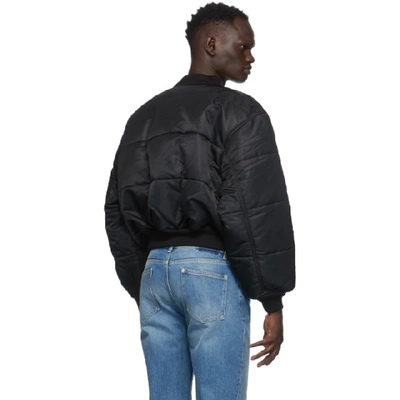 Shop Vetements Reversible Black And Navy Patch Bomber Jacket In Black / Nav