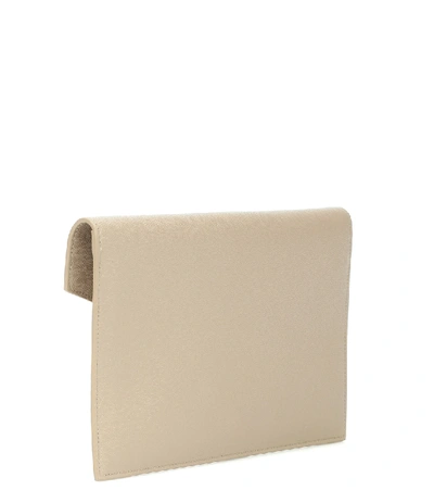 Shop Saint Laurent Uptown Leather Clutch In Beige