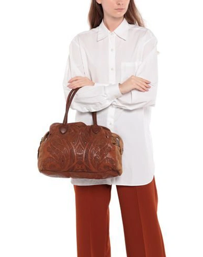 Shop Caterina Lucchi Handbag In Tan