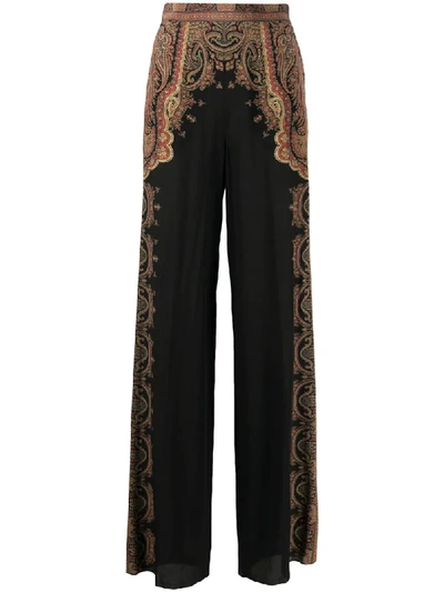 Shop Etro Floral Print Palazzo Trousers In Black