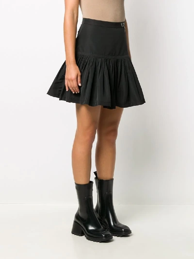 Shop Valentino Vltn Star-patch Mini Skirt In Black