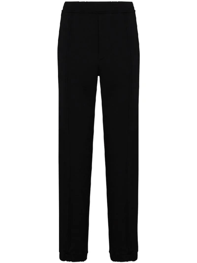 Shop Fendi Logo Tape Track Pants In Black