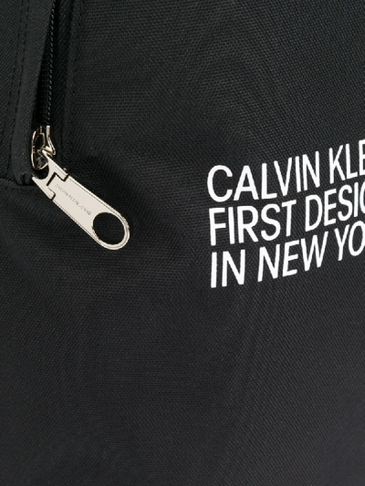 Shop Calvin Klein Round Logo-print Backpack In Black