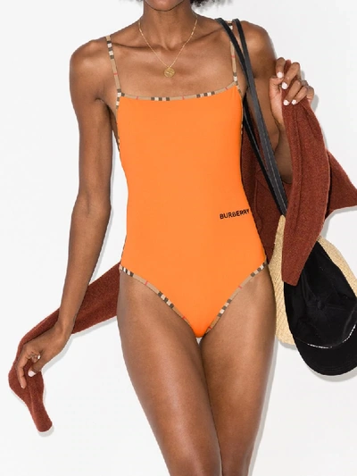 Shop Burberry Vintage Check Trim Swimsuit In Orange