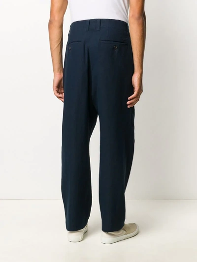 Shop Issey Miyake Pleat-front Loose Trousers In Blue