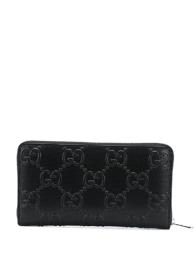 Shop Gucci Gg Embossed Wallet In Black