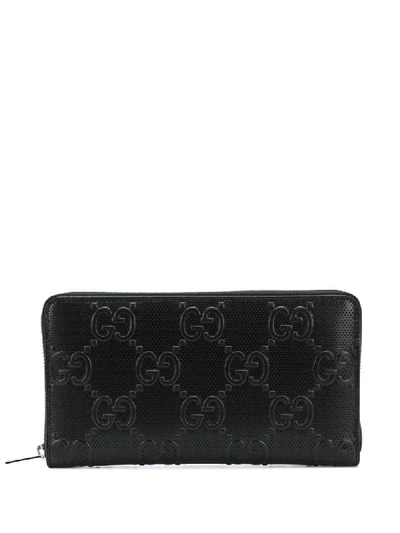 Shop Gucci Gg Embossed Wallet In Black