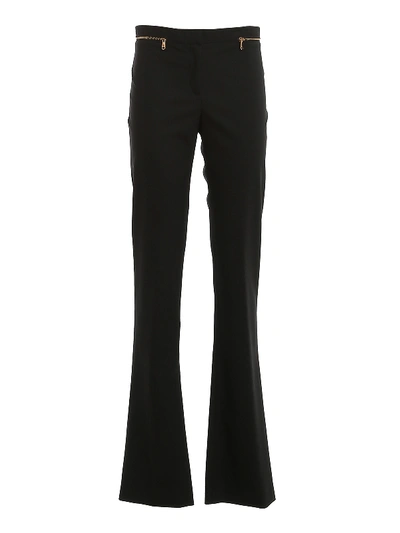 Shop Versace Stretch Wool Flared Leg Trousers In Black
