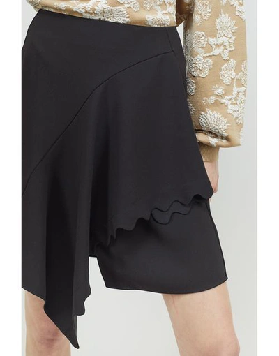 Shop Chloé Asymmetrical Drape Skirt In Black