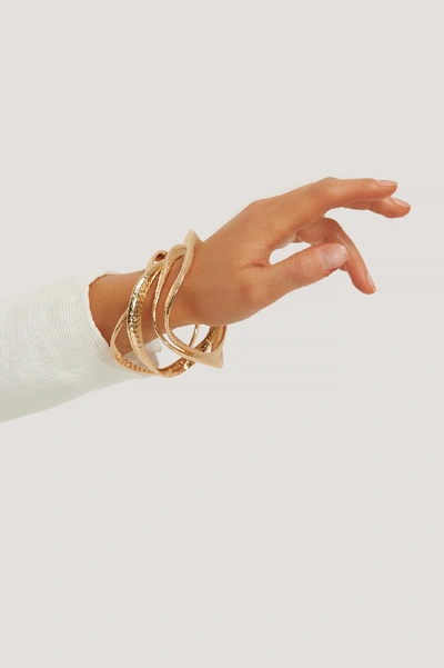 Shop Na-kd Hammered Wavy Bracelets - Gold