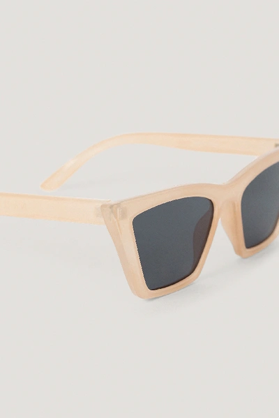 Shop Na-kd Pointy Edge Squared Cateye Sunglasses In Beige