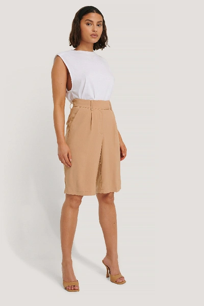 Shop Na-kd Pleated Shorts - Beige