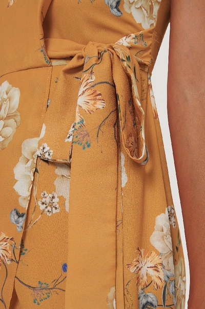 Shop Na-kd Tie Waist Overlap Dress - Yellow In Orange Flower