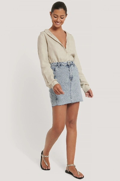 Shop Nicole Mazzocato X Na-kd Raw Hem Denim Mini Skirt - Blue In Blue Wash